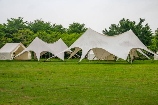 istock Camping tents on outdoor park grasslands 2158236931