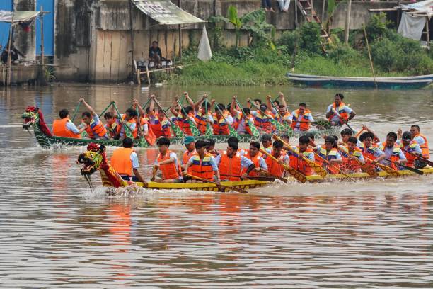 Leader takes command in dragon boat race.