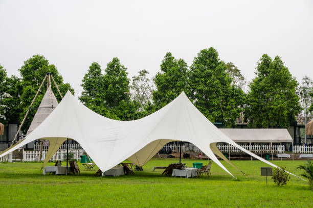 istock Camping tents on outdoor park grasslands 2158237360