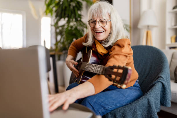 Senior Woman's Acoustic Guitar Session