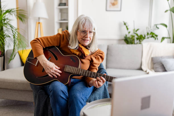 istock Senior Woman's Acoustic Guitar Session 2158237779