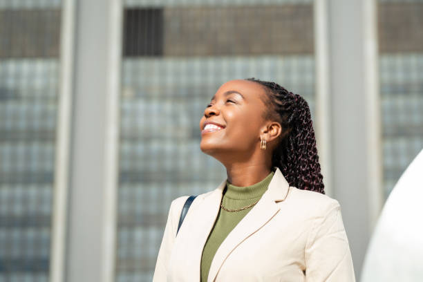 istock Confident Black Businesswoman Smiling Outdoors in Urban Setting 2158237903