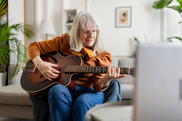 istock Senior Woman's Acoustic Guitar Session 2158237951