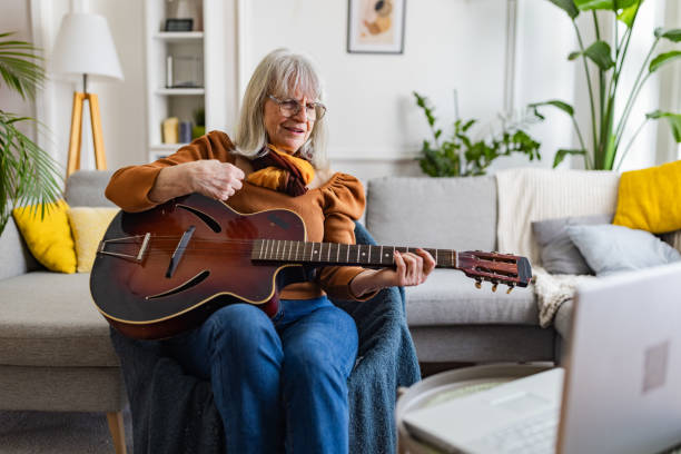 istock Senior Woman's Acoustic Guitar Session 2158237967