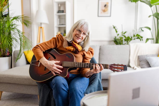 istock Senior Woman's Acoustic Guitar Session 2158238256