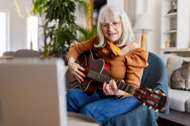 istock Senior Woman's Acoustic Guitar Session 2158238320