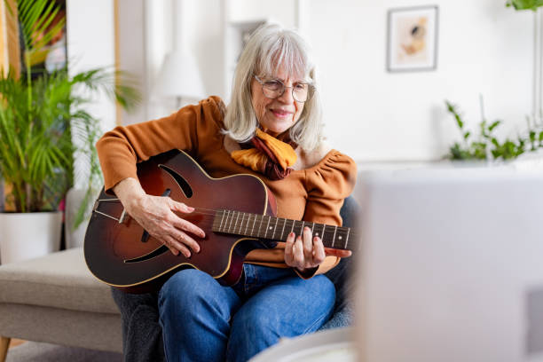 istock Senior Woman's Acoustic Guitar Session 2158238343
