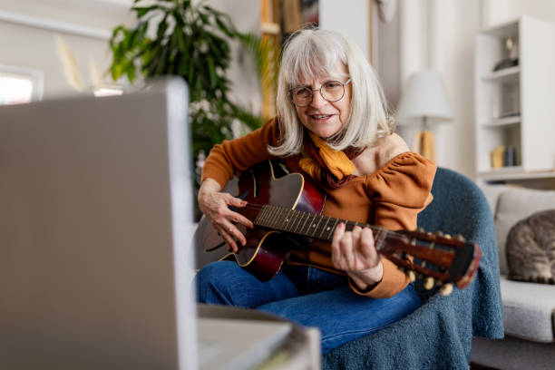 istock Senior Woman's Acoustic Guitar Session 2158238387