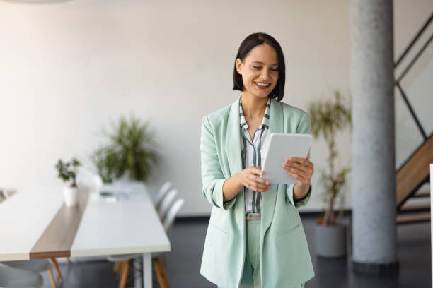 istock Portrait of Modern Businesswoman Using Tablet 2158238879