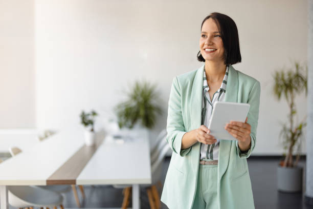 istock Portrait of Modern Businesswoman Using Tablet 2158238911