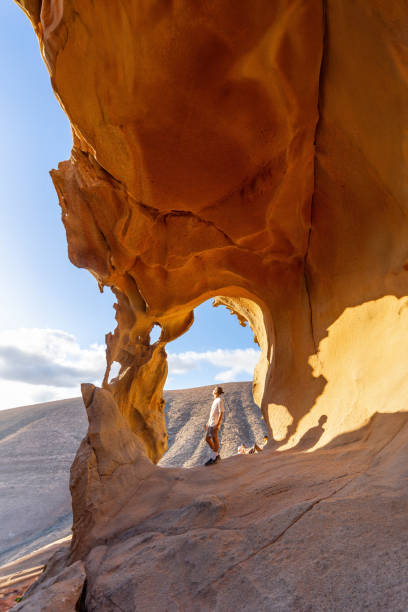 istock Marveling at the Natural Rock Formation at Arco De Las Penitas, Midday Adventure 2158240301