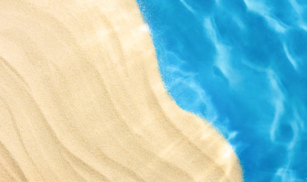 istock sand and sea water 2158241533