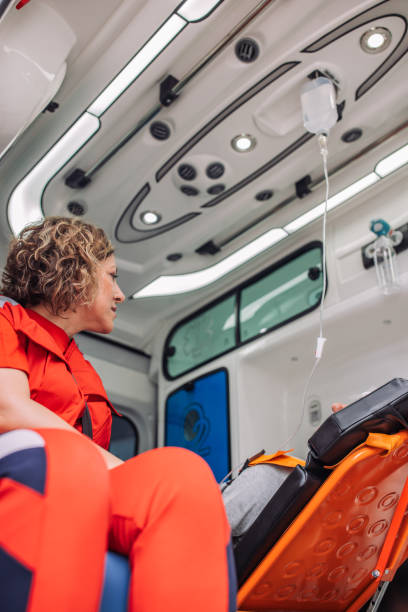 istock Patient in ambulance with IV drip 2158245237