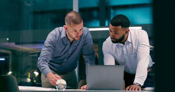 Detective, technology and review in workplace together for teamwork, collaboration and partnership with strategy. Man, investigation and laptop for justice, corruption and crime with video evidence