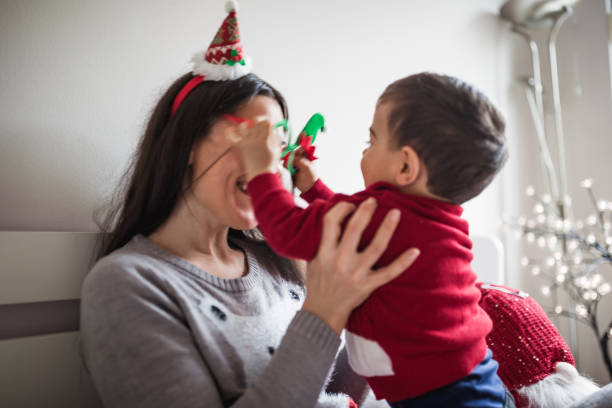 istock Christmas Morning Fun with Mom and Baby 2158245917