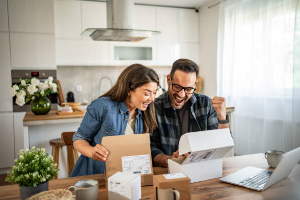 istock unpacking a package that came to them online 2158245938