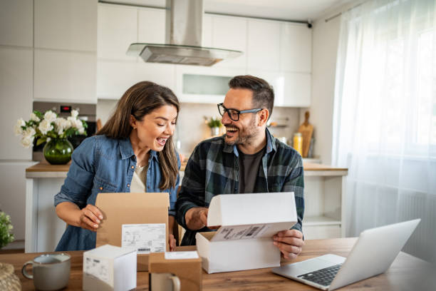 istock unpacking a package that came to them online 2158245946