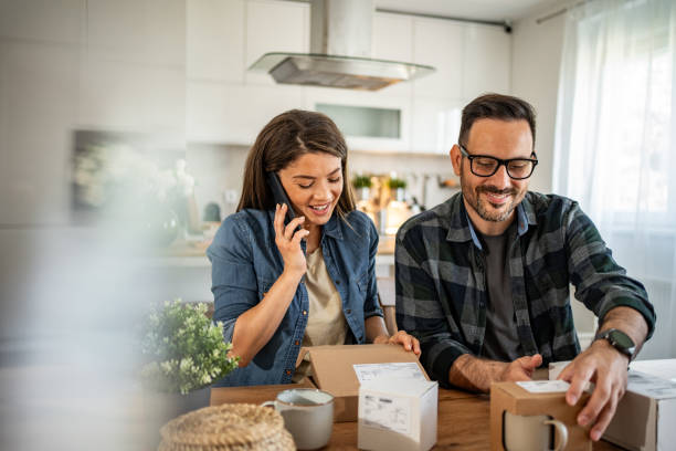 istock unpacking a package that came to them online 2158246025
