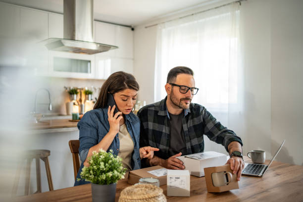 istock unpacking a package that came to them online 2158246027