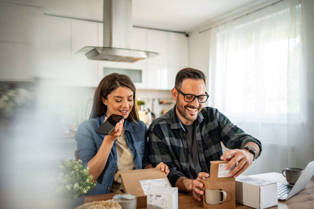 istock unpacking a package that came to them online 2158246041