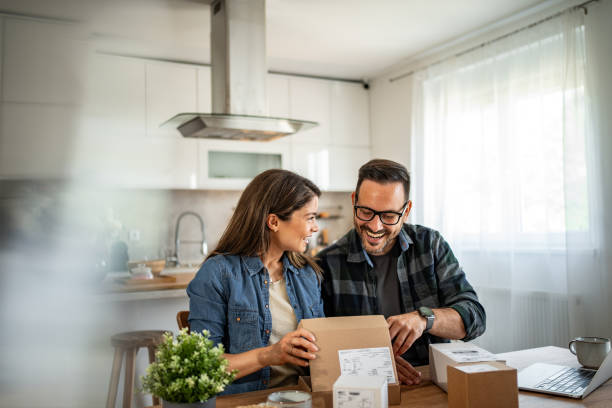 istock unpacking a package that came to them online 2158246059