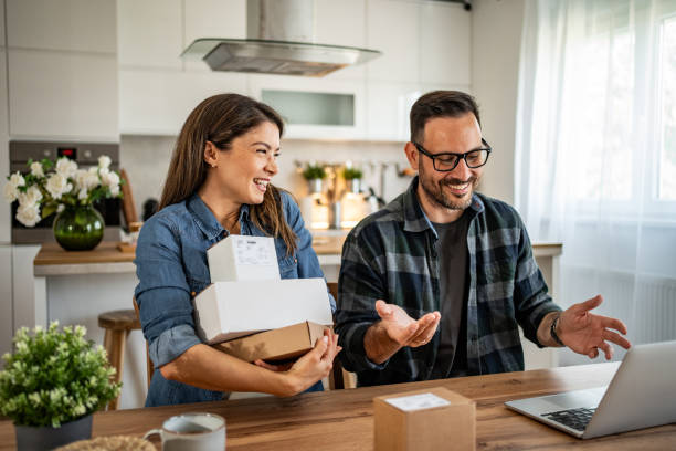 istock unpacking a package that came to them online 2158246067
