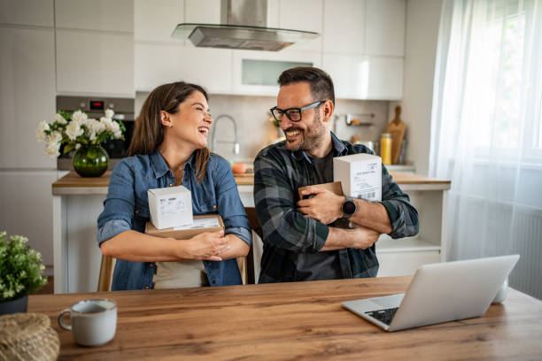 istock unpacking a package that came to them online 2158246080
