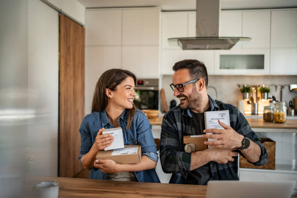 istock unpacking a package that came to them online 2158246102