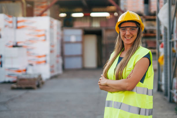 istock portrait of female worker in warehouse 2158250927