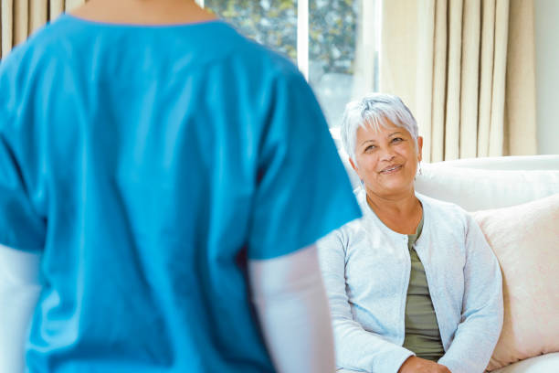istock Nurse walking in to see patient 2158251107