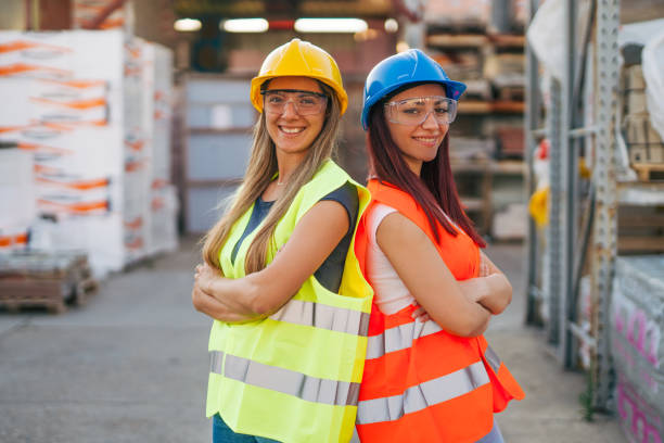 istock portrait of two female worker in warehouse 2158251375