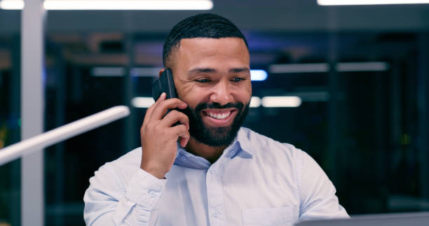 istock Talking, businessman and phone call smiling for communication, networking or customer support. Speaking, male person and mobile tech in office for deal, proposal and negotiation or idea planning 2158252546