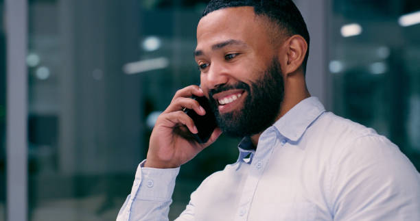 istock Discussion, businessman and phone call smiling for communication, networking or customer support. Speaking, male person and mobile tech in office for deal, proposal and negotiation or idea planning 2158252549
