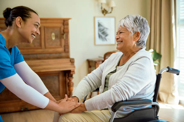 istock A nurse is checking in on her patient 2158254528