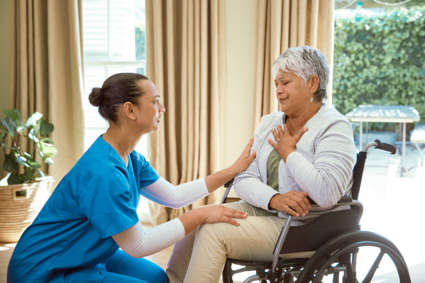 istock A nurse is seen comforting a coughing patient 2158254587