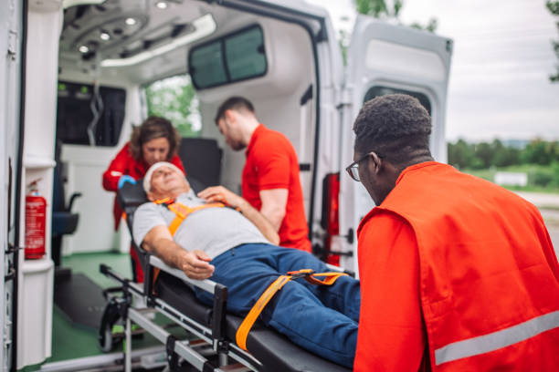 istock Paramedics securing a patient for transport 2158255761