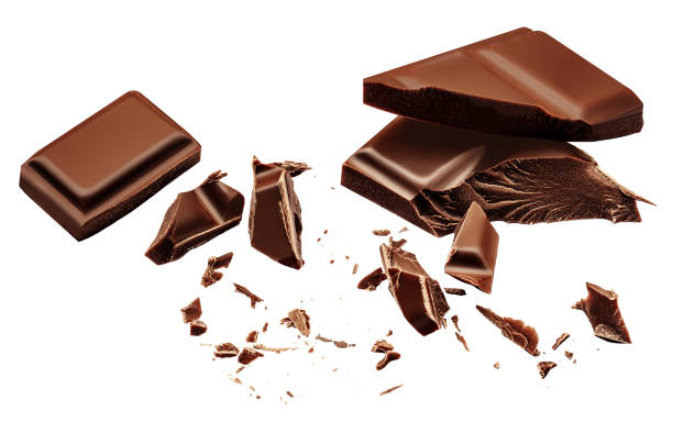 istock Explosion  of milk chocolate bar pieces isolated on white background. Pattern.  Crumbs, shavings and Flying Chocolate chunks Top view. Flat lay 2158256546