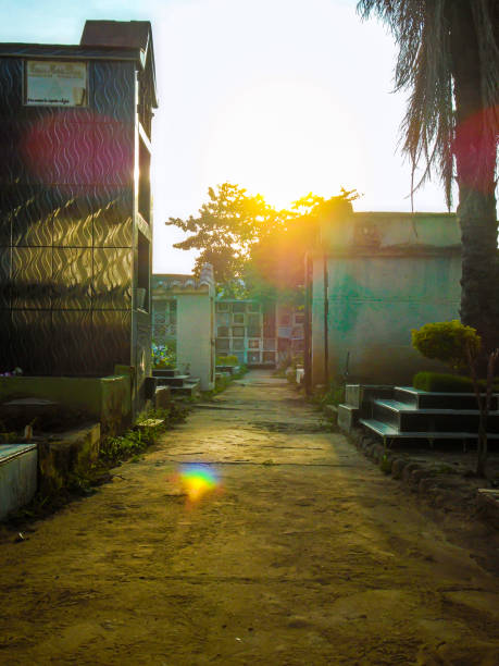 Neiva, Huila, Colombia - January 9, 2024 - Path inside the Central Cemetery of Neiva on a hot afternoon