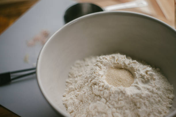 istock Prepping Sourdough Bread on a Wooden Background 2158257962