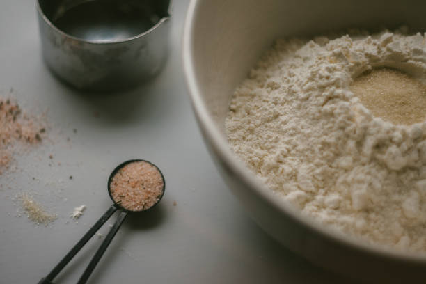 istock Prepping Sourdough Bread on a Wooden Background 2158257977