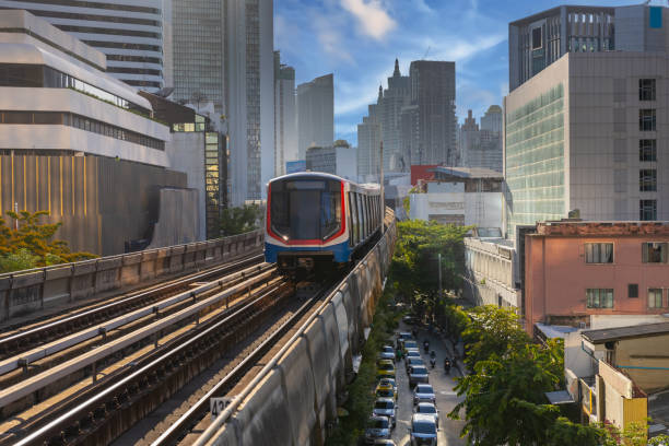 istock BKK BTS Bangkok Mass Transit System Sky train which is an elevated tram over the busy streets oh BKK Thailand 2158260425