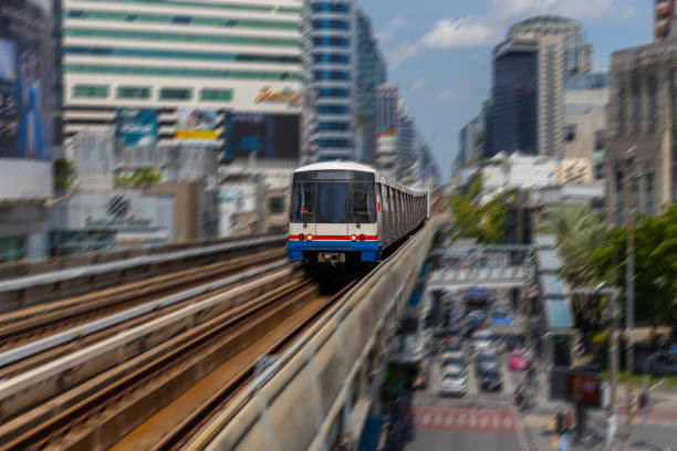 istock BKK BTS Bangkok Mass Transit System Sky train which is an elevated tram over the busy streets oh BKK Thailand 2158260461