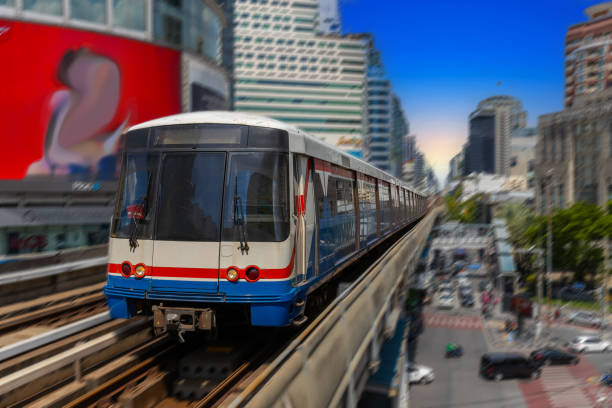 BKK BTS Bangkok Mass Transit System Sky train which is an elevated tram over the busy streets oh BKK Thailand