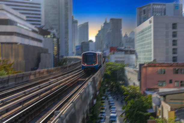 istock BKK BTS Bangkok Mass Transit System Sky train which is an elevated tram over the busy streets oh BKK Thailand 2158260583