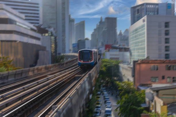 istock BKK BTS Bangkok Mass Transit System Sky train which is an elevated tram over the busy streets oh BKK Thailand 2158260682
