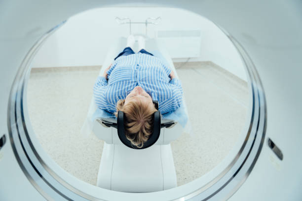 istock Woman enters into MRI capsule. 2158266380