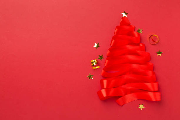 istock Creative handmade christmas tree with decor on color background, top, view 2158273199