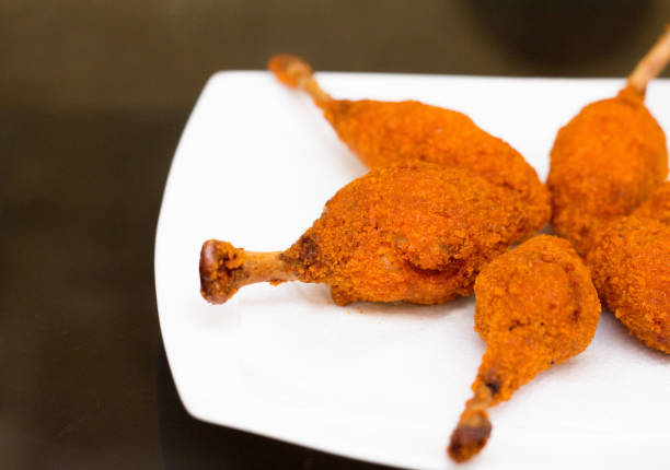 A plate of chicken drumsticks