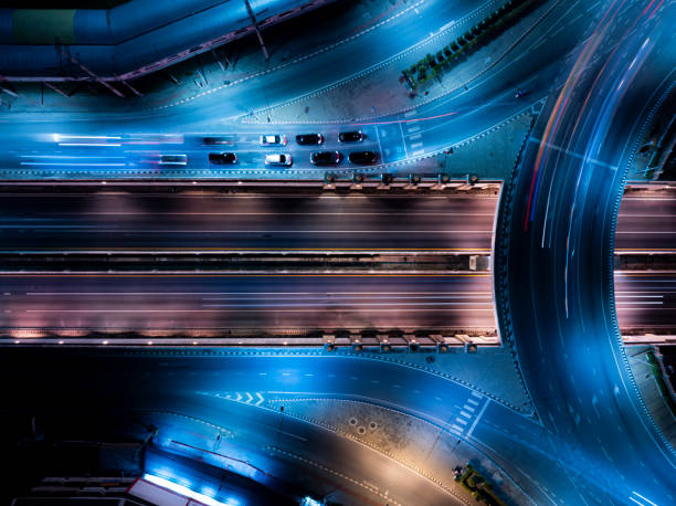 istock Expressway top view, Road traffic an important infrastructure, Drone aerial view fly in circle, traffic transportation, Public transport or commuter city life concept of economic and energ, transport. 2158273996