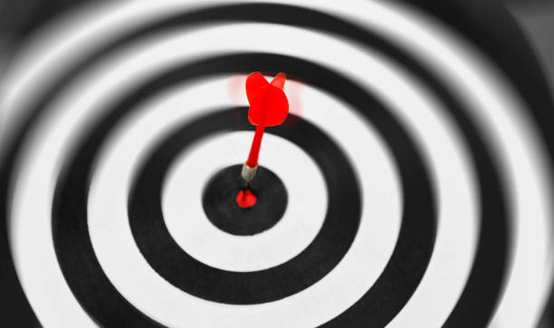 istock Dart in the center of dartboard 2158274100